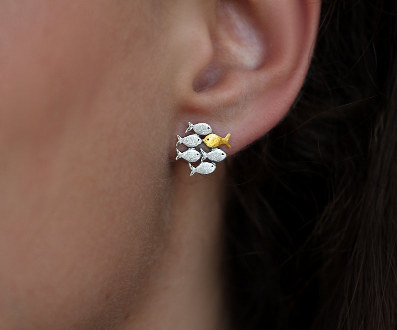 Swimming against the current. Mismatch stud earrings. School of fish with golden fish swimming upstream image 4
