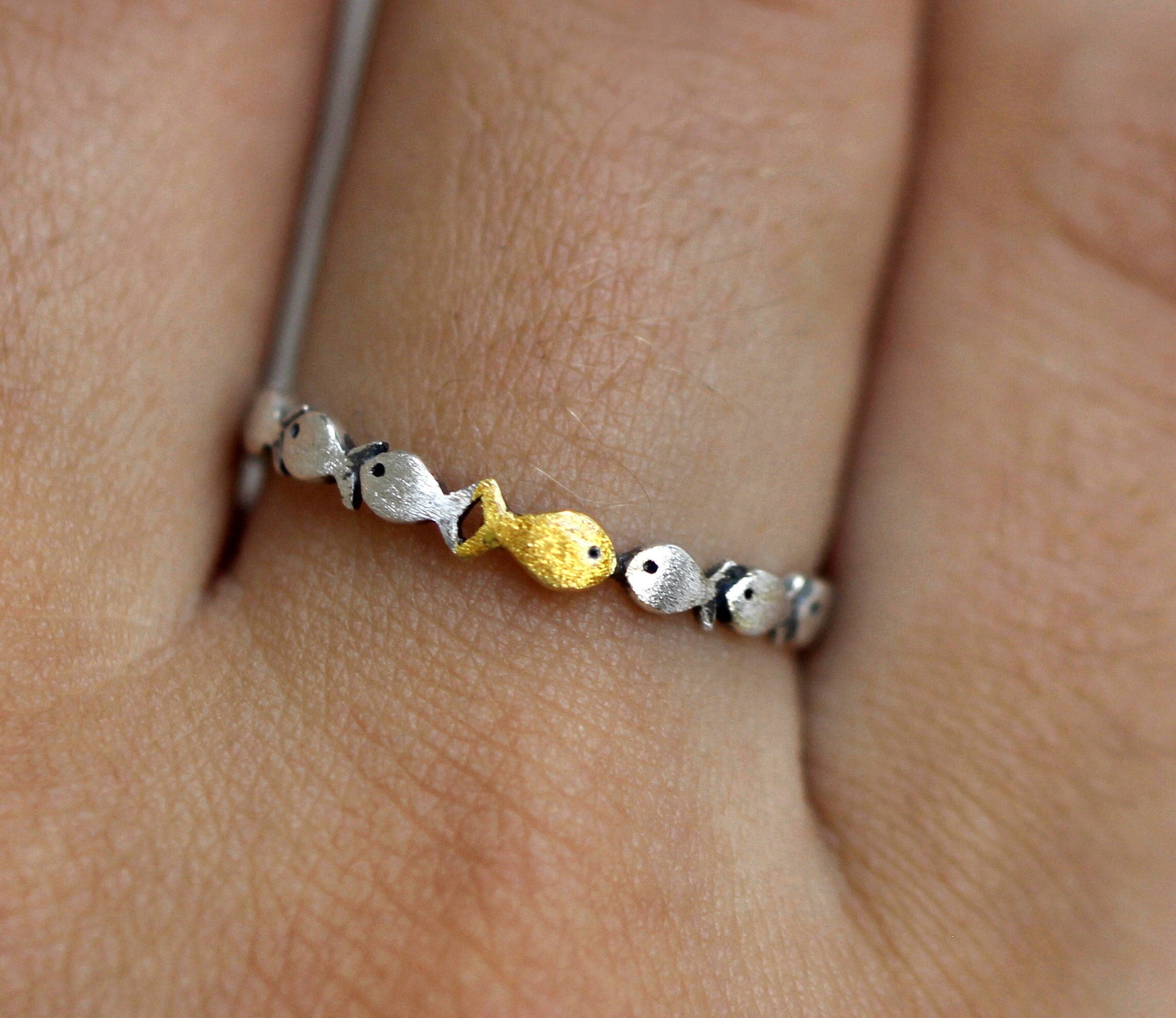 Against the Current. Dainty sterling silver ring. One golden fish swimming upstream. Stackable ring for women.