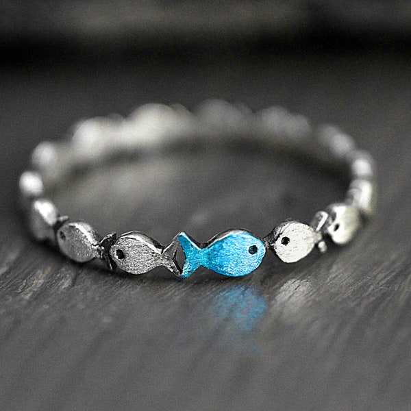 Swimming against the current. DAINTY sterling silver ring. School of fish with a blue turquoise one swimming upstream. Gift for her.