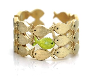 Against the current. Gold vermeil fish ring with one light green enamel fish swimming upstream. Best holiday gifts for her. Adjustable.