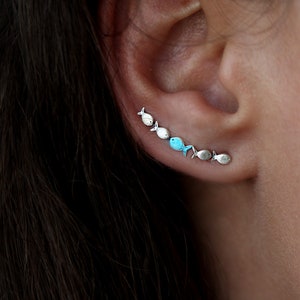 Against The Current ear climber. Against the tide with one blue turquoise fish swimming upstream. Sterling silver fish earrings. image 5