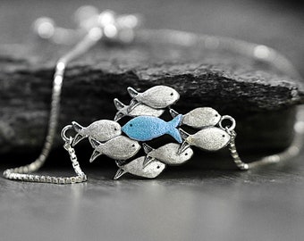 Swimming against the current bracelet. 925 sterling silver and blue turquoise enamel. One fish swimming upstream. Unique gift for her.