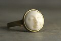Moon Face Ring. Hand casted full moon in brass gold setting. Gold plated. Eco friendly white resin. Vegan. Adjustable ring for her.