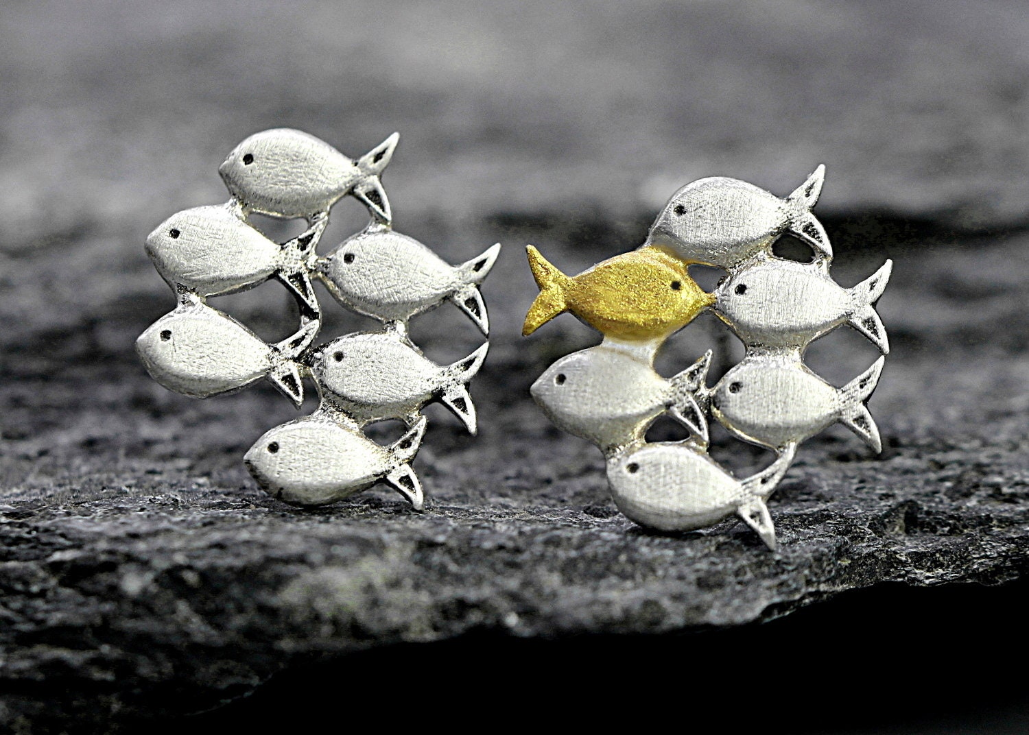 Swimming against the current. Dainty silver necklace. School of fish with one golden enameled fish swimming upstream. Gift for her.