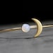 Crescent Moon bangle with glass opal. Hand patinated gold. Fully adjustable. Gift for her. 