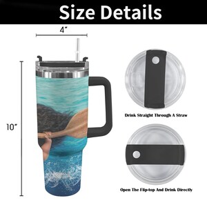 May include: A 10-inch tall tumbler with a black handle and a lid. The tumbler has a blue and white design with a person paddling a canoe. The tumbler is 4 inches wide. The lid has a straw opening and a flip-top opening.