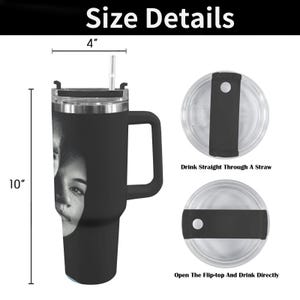 May include: Black insulated tumbler with a handle, a straw, and a lid. The tumbler is 10 inches tall and 4 inches wide. The tumbler has a black and white image of a person's face. The lid has two options: drink straight through a straw or open the flip-top and drink directly.
