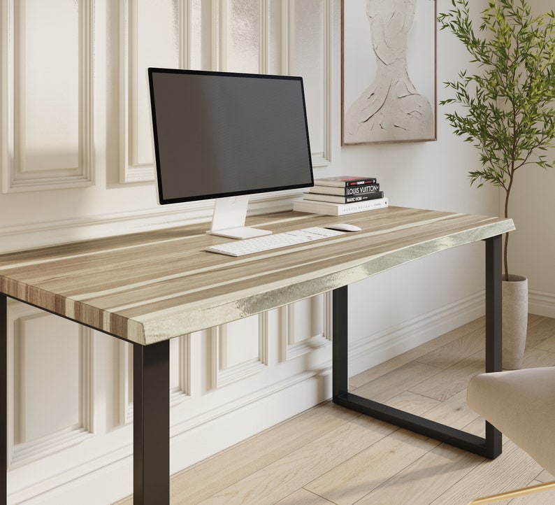 Stylish live edge desk made from rich teak wood.