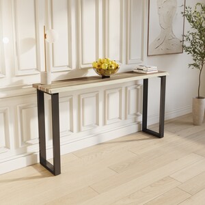 Stylish solid teak wood console with minimalist metal legs, perfect for entryways or living rooms.