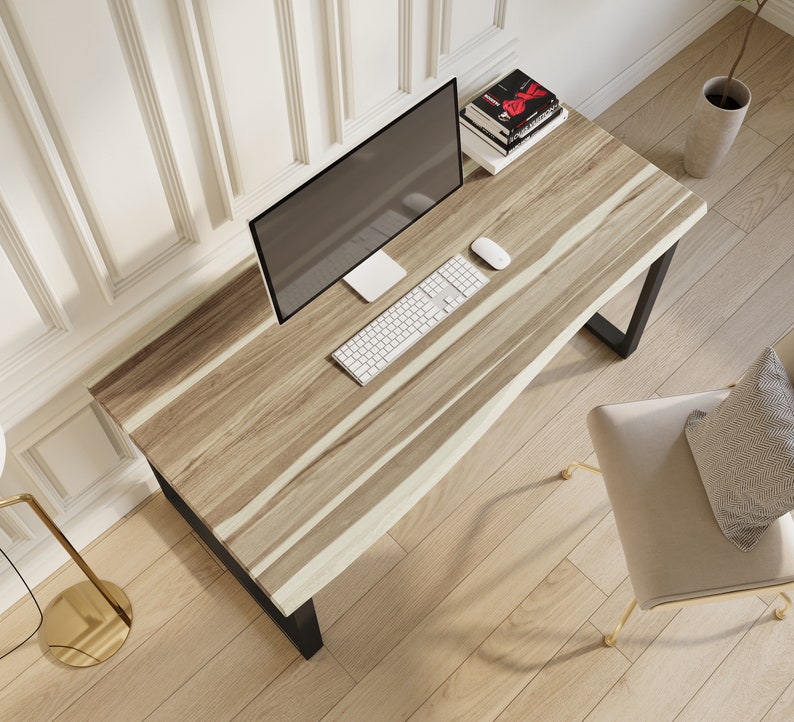 Stylish live edge desk made from rich teak wood.