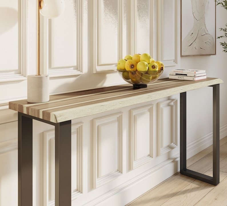 Stylish solid teak wood console with minimalist metal legs, perfect for entryways or living rooms.