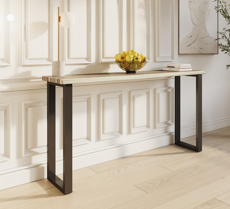 Stylish solid teak wood console with minimalist metal legs, perfect for entryways or living rooms.