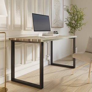 Stylish live edge desk made from rich teak wood.