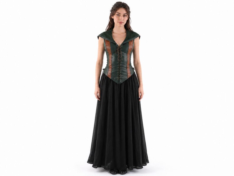 May include: A sleeveless bodice featuring a dark green textured front with brown vertical panels and a central lace-up closure, paired with a floor-length black skirt. The bodice has a wide collar and a pointed hemline, while the skirt is full.