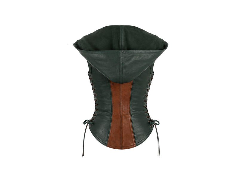 May include: A sleeveless hooded vest featuring a dark green exterior with a central vertical brown panel. The garment includes side lacing details with thin cords tied at the bottom hem, providing an adjustable fit along the torso sides.