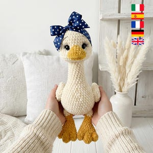 May include: A set of three ceramic mugs with a speckled, matte finish. Each mug is a different colour: light blue, cream, and grey. The mugs have a simple, modern design with a rounded shape and a comfortable handle.