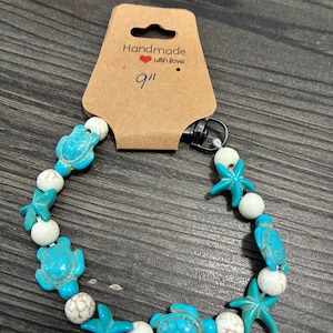 Strand - Sköldpadda- och sjöstjärnarmband i 3 storlekar.