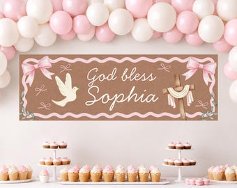 May include: A rectangular banner with a brown background and a wavy pink border. It features the text 'God bless Sophia' in white script, a white dove illustration, a wooden cross with a white cloth, and pink bows at the top corners.