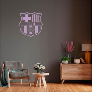 May include: A rustic wooden sign with the text "Welcome to our home" in white lettering. The sign has a distressed finish and a simple, inviting design, ideal for entryway decor.