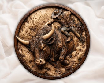May include: A round, wooden relief carving depicting a cowboy riding a bucking bull. The cowboy is wearing a hat, vest, and chaps. The bull is dark brown with large horns. The carving is set within a dark brown wooden frame.