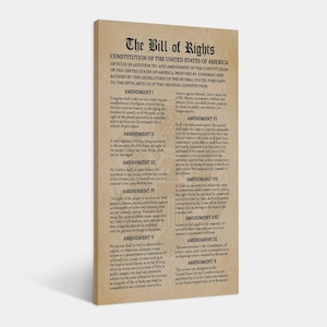 May include: A canvas print of the Bill of Rights, the first ten amendments to the U.S. Constitution. The text is printed in black on a parchment-style background, with the title at the top. The amendments are numbered and listed in columns.
