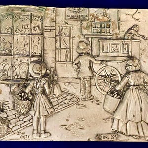 May include: A set of three ceramic nesting bowls in shades of blue, green, and white. The bowls feature a speckled glaze and a simple, modern design. The largest bowl is approximately 6 inches in diameter.