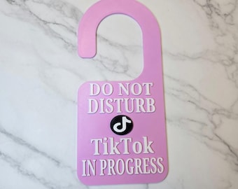 Do not disturb Tik Tok in progress door knob sign