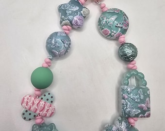 Schlüsselanhänger : Taschenanhänger mit Schmetterlingsmotiven auf Acrylperlen