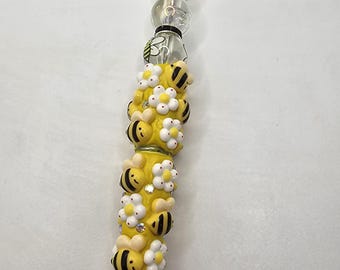 Charakter inspirierter Perlenkugelschreiber mit Hummel-Motiv in gelb, schwarz und weiß
