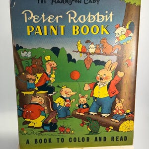 May include: A rustic wooden sign with the text "Welcome to our home" in white lettering. The sign features a distressed finish and a simple, inviting design, perfect for front door decor.