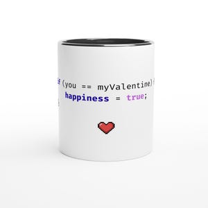 Peut inclure: Mug en céramique blanche avec un bord intérieur noir. Le mug affiche le texte "if (you == myValentine) happiness = true;" dans une police de programmation, ainsi qu'un cœur rouge pixélisé.