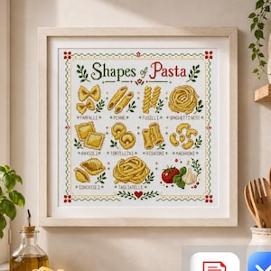 May include: A framed cross-stitch sampler titled "Shapes of Pasta" features various pasta shapes with their names. The artwork is in a light wooden frame and includes illustrations of farfalle, penne, fusilli, and spaghetti nest. A bowl of pasta and a bottle of olive oil are in the foreground.