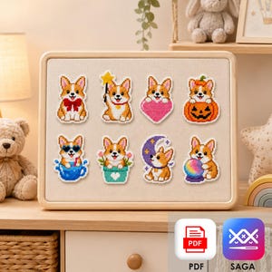 Può includere: Un pannello espositivo rettangolare di colore chiaro con otto distinti motivi a punto croce raffiguranti cani Corgi. I disegni includono un Corgi con un fiocco rosso, una bacchetta a stella, un cuore rosa, una zucca, una tazza blu, un vaso di fiori, una mezzaluna e una palla arcobaleno.