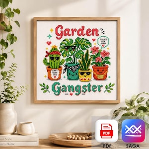 May include: A framed cross-stitch pattern featuring the text Garden Gangster with four potted plants wearing sunglasses. The plants include a cactus, a monstera, a snake plant, and a flowering plant, with small text reading Can't Touch This, Plants Over Drama, and Grow Boss.