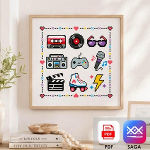 May include: A square cross-stitch pattern featuring a grid of nine retro icons including a cassette tape, vinyl record, sunglasses, boombox, game controller, microphone, film clapperboard, roller skate, and lightning bolt, framed by a heart border.