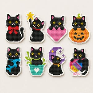 May include: Eight black cat cross-stitch patches featuring various designs: a cat with a red bow, a cat with a yellow star, a cat in a pink heart, a cat on a pumpkin, a cat with a blue fish, a cat in a teal pot, a cat with a purple moon, and a cat with a rainbow yarn ball.
