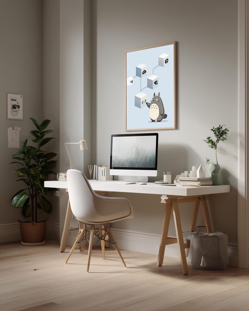 May include: A framed wall art print featuring a light blue background with a gray cartoon creature standing next to a vertical diagram of white cubes connected by lines, each cube displaying a unique black icon, displayed in a home office.
