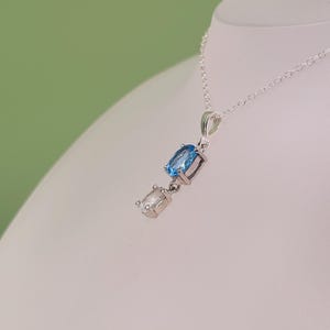 Colgante de topacio de plata, topacio azul y blanco suizo, piedras semipreciosas naturales, joyería hecha a mano, plata de ley, engaste de garras, collar
