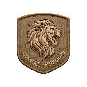 May include: Embroidered patch featuring a roaring lion's head in shades of brown and tan. The patch is shield-shaped with the words "LIONHEART - ELITE GUARD" in a curved font around the bottom edge. The patch has a brown border.