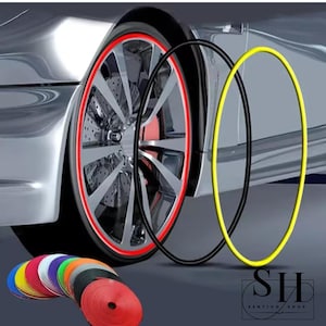 May include: A set of circular adhesive rim protector strips in various colours including red, yellow, black, blue, green, and white. The strips are shown as coiled rolls and applied as circular borders on a metallic car wheel rim.