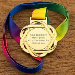 May include: A gold medal with a rainbow-coloured ribbon. The medal features a circular centre with the text "Your Text Here, Max of 4 lines, Max 20 characters a line, Choice of fonts". The ribbon transitions from blue to purple, red, yellow, and green.