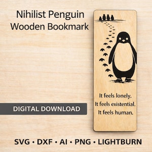 Może przedstawiać: Drewniana zakładka do książki z czarną ilustracją pingwina i tekstem "It feels lonely. It feels existential. It feels human." Zakładka zawiera również tekst "Nihilist Penguin Wooden Bookmark" i "DIGITAL DOWNLOAD".