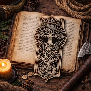 May include: A wooden bookmark with a detailed tree of life design, surrounded by runic symbols. The bookmark is set against an open book with aged pages, with a lit candle and an axe in the background. The bookmark is approximately 6 inches long.