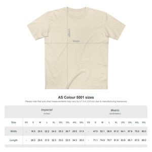 May include: A cream-colored t-shirt with a diagram showing width and length measurements. The size chart below provides measurements in inches and centimeters for various sizes, from XS to 5XL. The text "AS Colour 5001 sizes" is also visible.