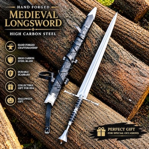 May include: A hand-forged longsword with a high carbon steel blade, a crossguard, and a black wrapped handle with a metal pommel. The sword includes a black leather scabbard with metal fittings and straps. Text reads: HAND FORGED MEDIEVAL LONGSWORD.