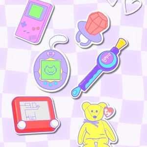 May include: A collection of six stickers featuring a pink handheld gaming console, a purple digital pet device with a cat icon, a red ring pop, a purple Bop It game, a red water ring toss game, and a yellow teddy bear with a heart-shaped tag.