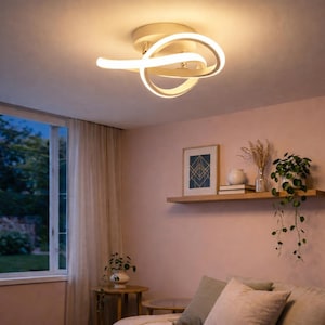 Moderne chromen LED-plafondlamp met oneindige lus, ideaal voor luxe woonkamer- en slaapkamerverlichting.