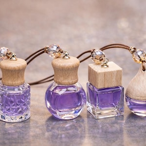 May include: A set of three ceramic mugs with a speckled, matte finish. The mugs are in shades of cream, light gray, and dark gray. Each mug has a simple, minimalist design, perfect for coffee or tea.