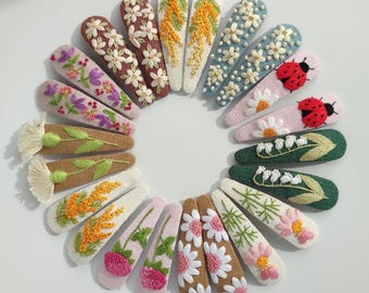 Horquillas florales bordadas a mano: pinzas de lino para el cabello de niñas pequeñas.