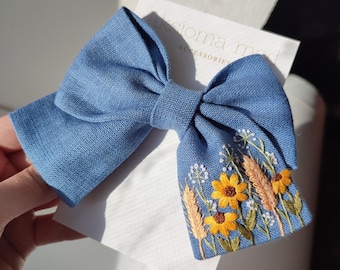 Handmade linen bow with a floral pattern, a gift for girls
